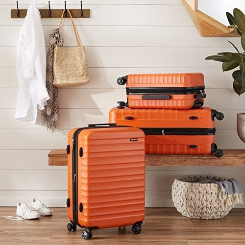 Amazon Basics Expandable Hardside Carry-On Luggage, 20-Inch Spinner with Four Spinner Wheels and Scratch-Resistant Surface, Orange - Image 7